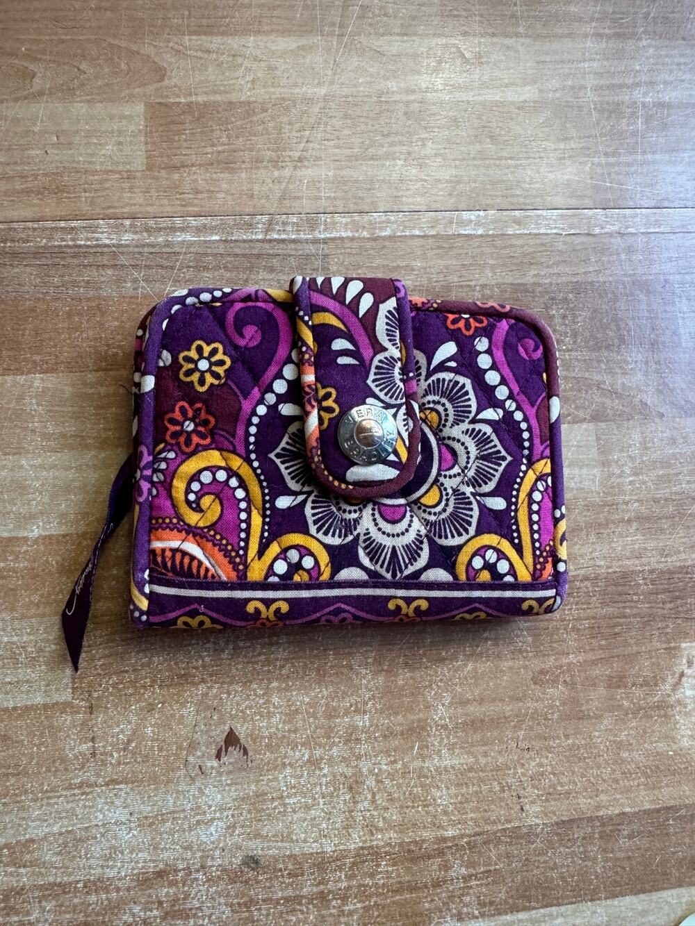 Vera Bradley Turnlock Wallet in the retired Safari Sunset pattern.